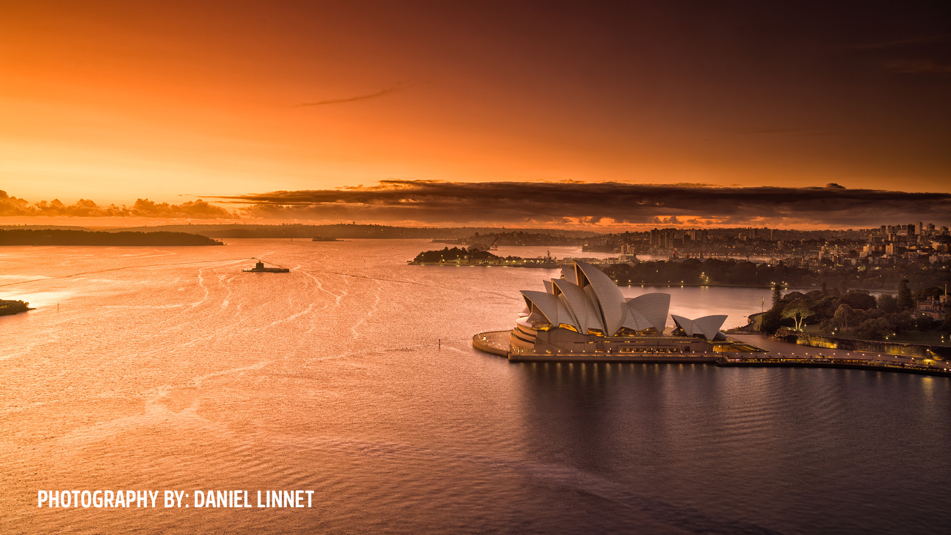 view of sydney harbour and sydney opera house from the pylon lookout at sunrise